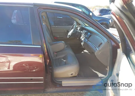 2001 Ford Crown Victoria Lx z USA, uszkodzony, nr VIN 2FAFP74W51X133116